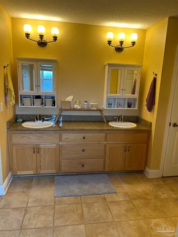 a kitchen with a cabinets and sink