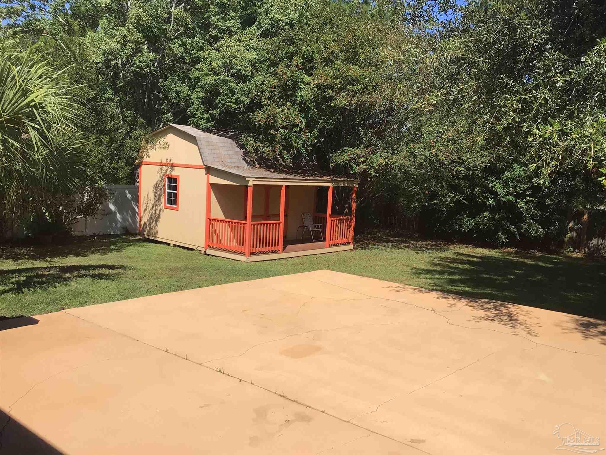 5668 Als Way Milton, FL 32583 - Photo 36 of 48 a view of backyard with green space