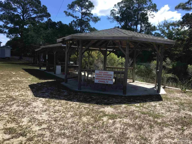 a view of outdoor space patio swimming pool and outdoor seating