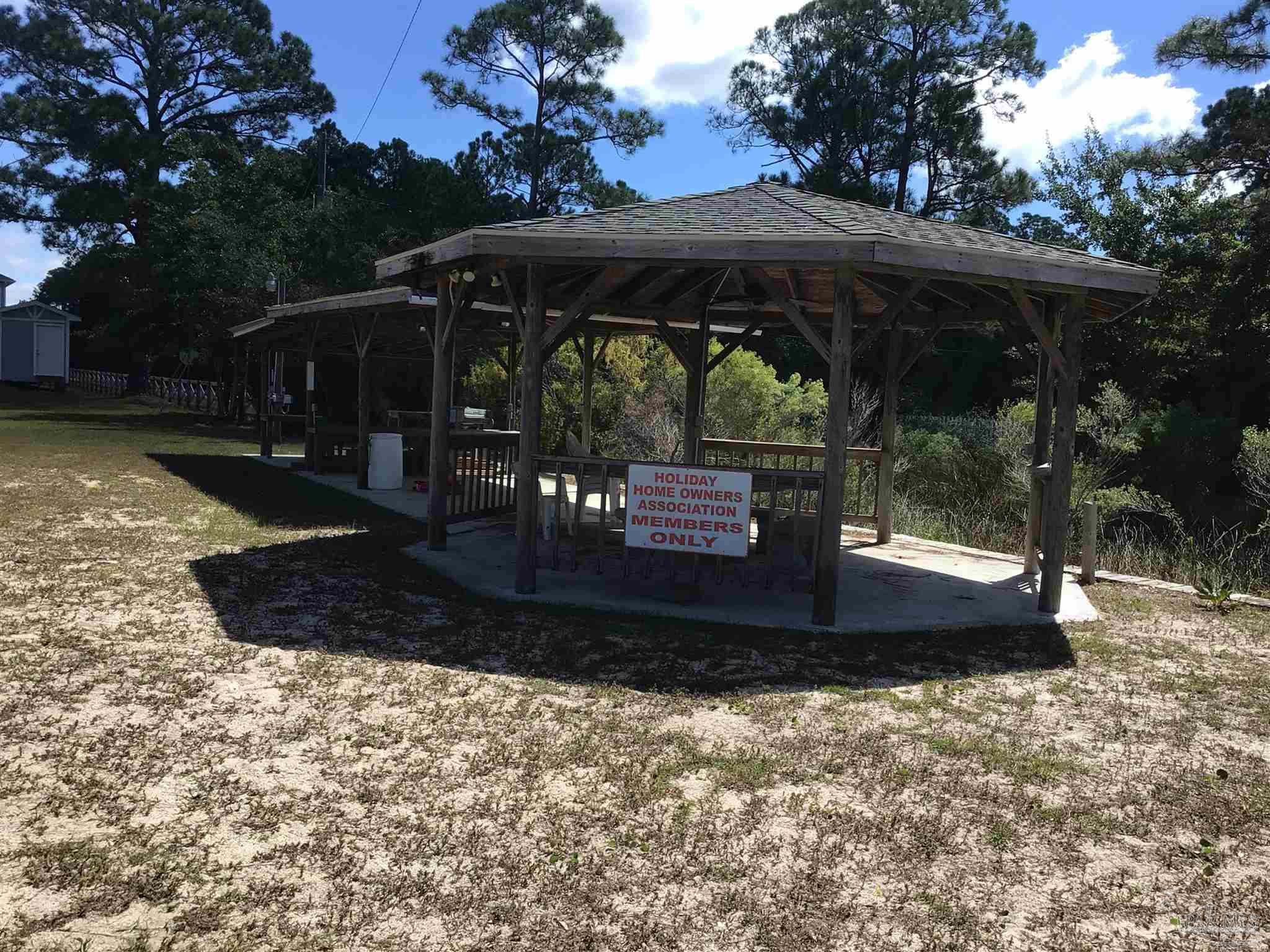 5668 Als Way Milton, FL 32583 - Photo 46 of 48 a view of outdoor space patio swimming pool and outdoor seating