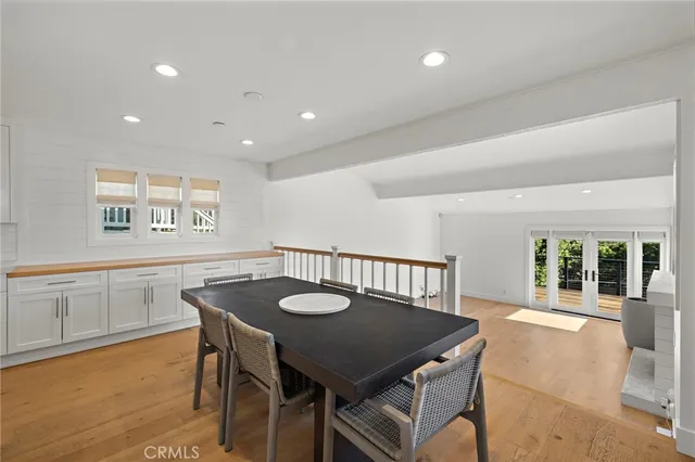 a view of a dining table and chairs