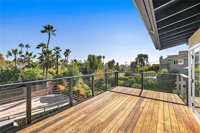 a view of balcony with a potted plant