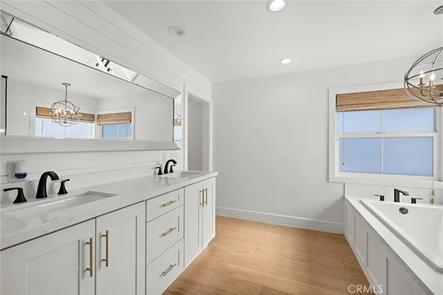 a bathroom with a sink and a bathtub