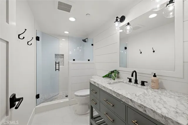 a view of entryway with stairs and wooden floor