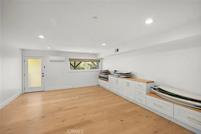 a view of house with garden and patio