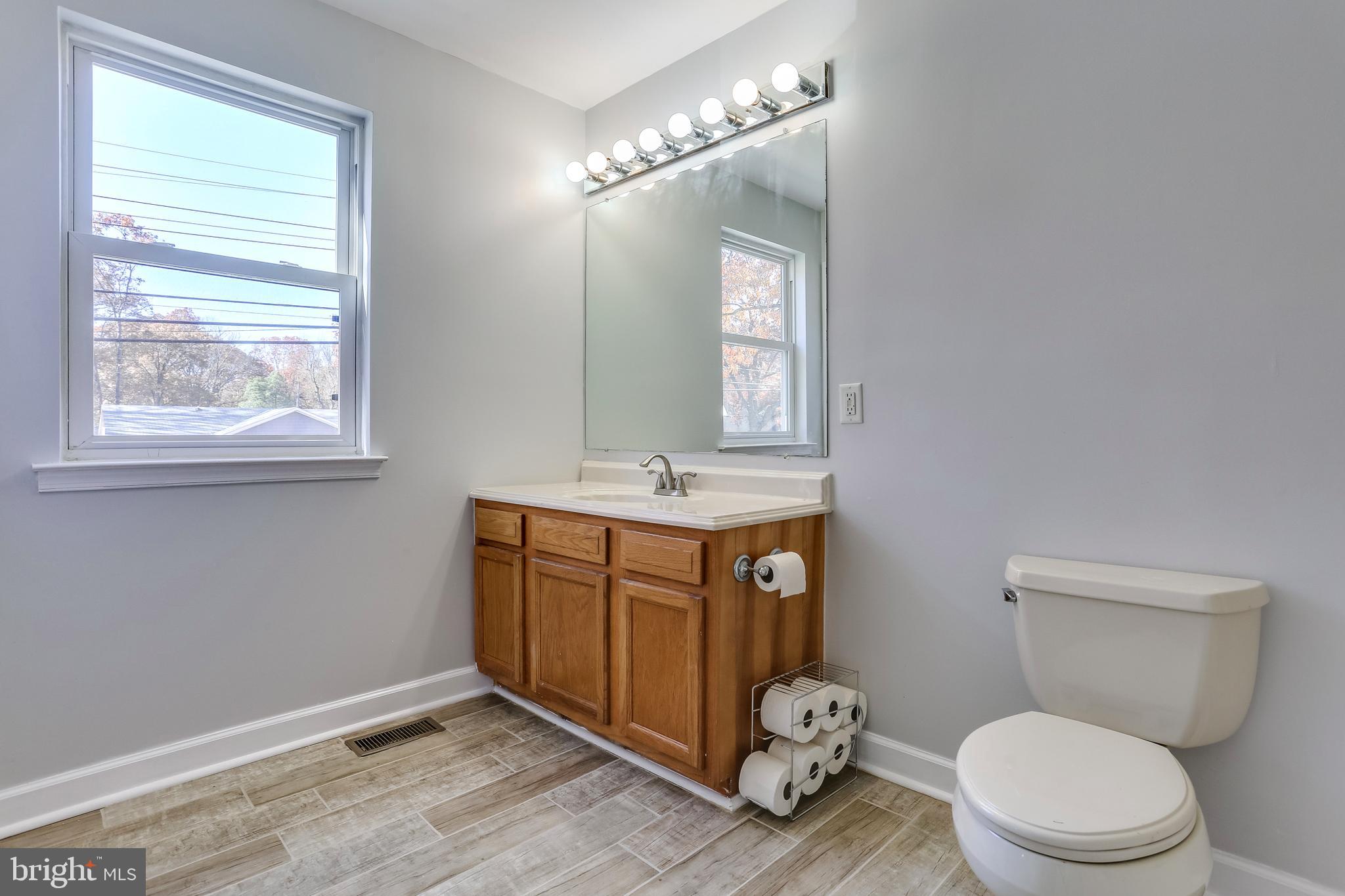 263 Hickory Point Road Pasadena, MD 21122 - Photo 17 of 33 remodeled Guest Bath upstairs