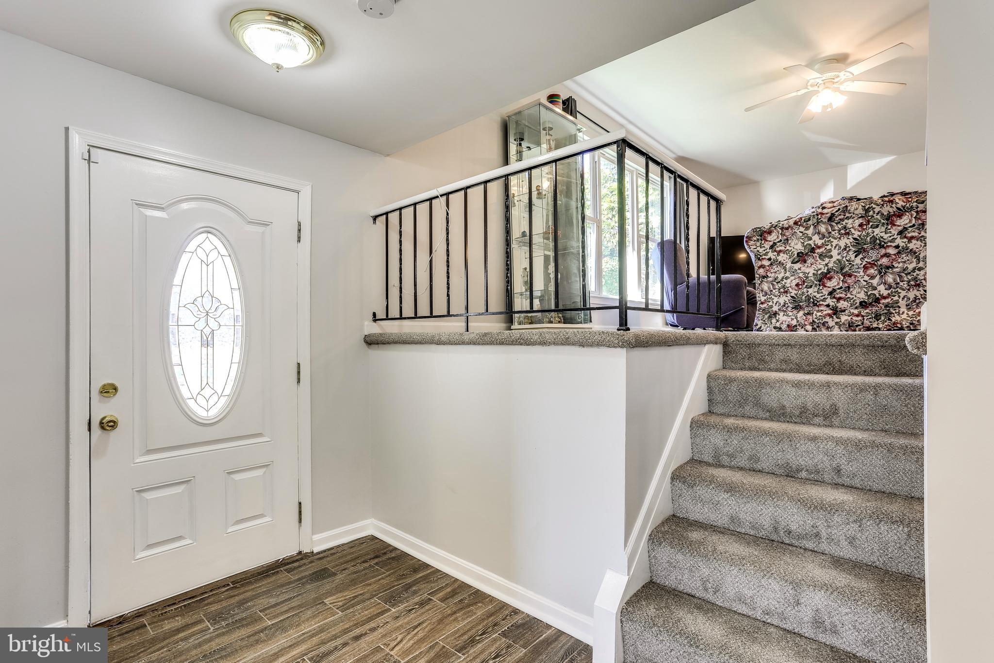 263 Hickory Point Road Pasadena, MD 21122 - Photo 3 of 33 Enter the well lit Foyer. New flooring and carpet.