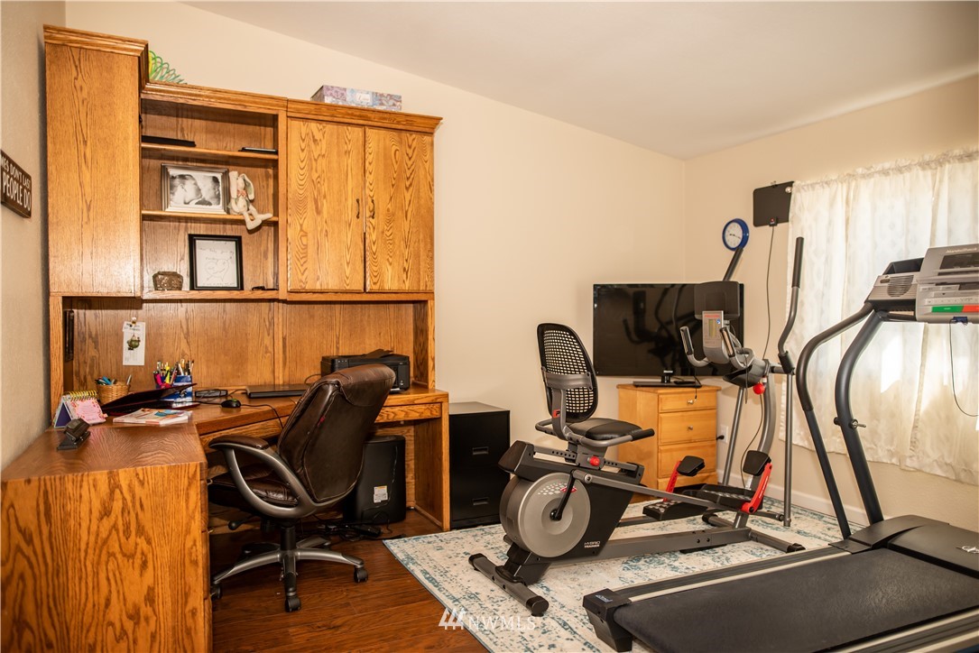172 Fluckinger Road Toledo, WA 98591 - Photo 22 of 39 a view of a workspace with furniture and a window