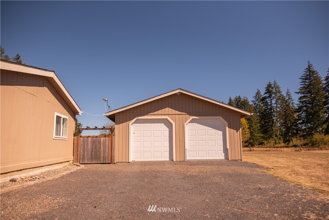 172 Fluckinger Road Toledo, WA 98591 - Photo 26 of 39 a front view of a house with a yard