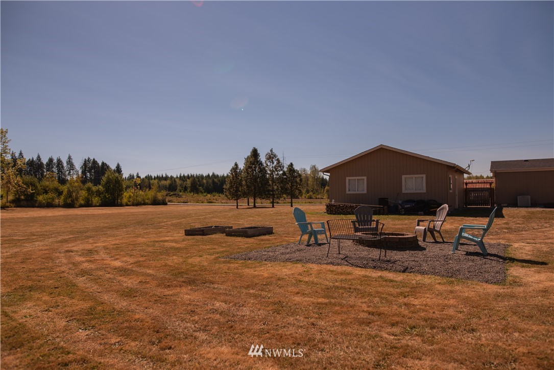 172 Fluckinger Road Toledo, WA 98591 - Photo 33 of 39 a view of house with outdoor space and seating