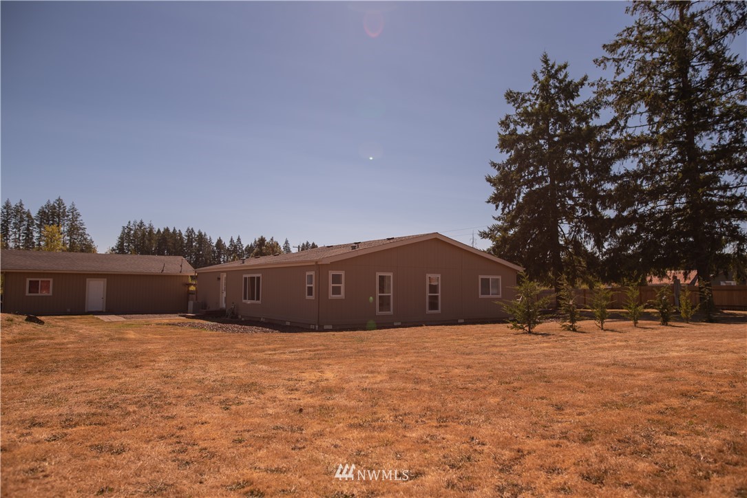 172 Fluckinger Road Toledo, WA 98591 - Photo 35 of 39 a view of a house with a yard