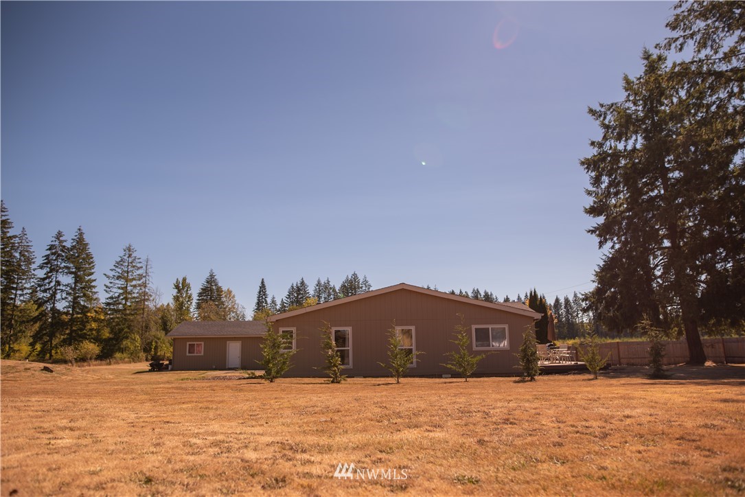 172 Fluckinger Road Toledo, WA 98591 - Photo 36 of 39 a view of a house with a yard