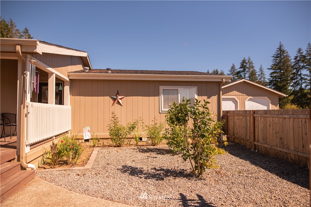 172 Fluckinger Road Toledo, WA 98591 - Photo 7 of 39 a view of a house with a wooden fence