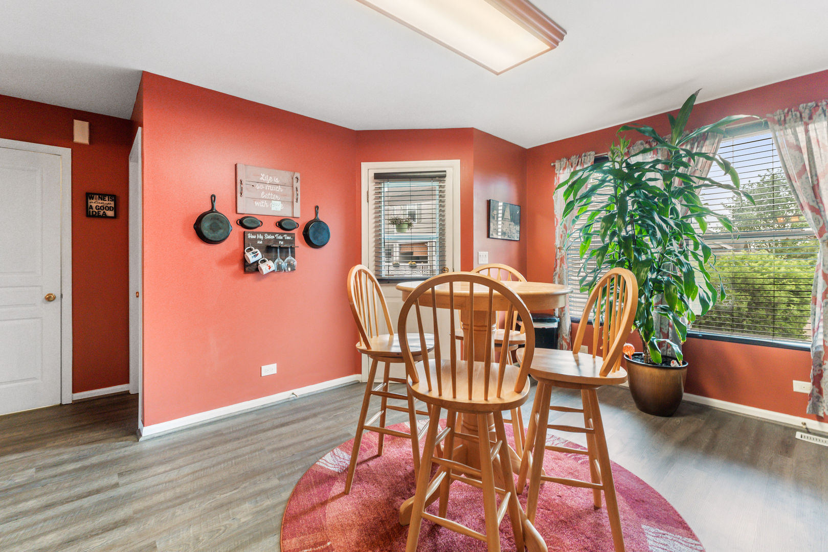 2539 Emily Lane Elgin, IL 60124 - Photo 6 of 15 a dining room with furniture and wooden floor