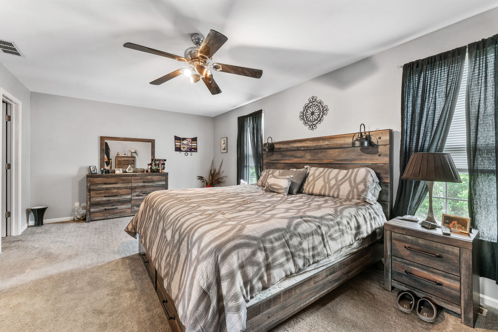 2539 Emily Lane Elgin, IL 60124 - Photo 8 of 15 a bedroom with a bed and ceiling fan