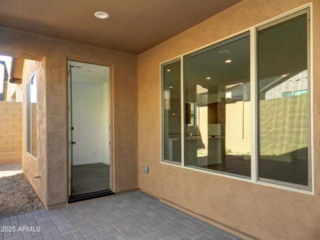 a view of a bathroom with a glass door