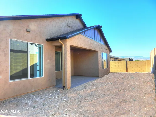 a view of backyard of house