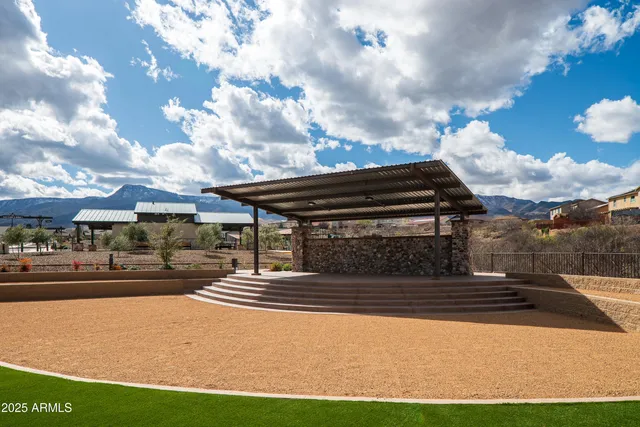 a view of a patio with a table and chairs