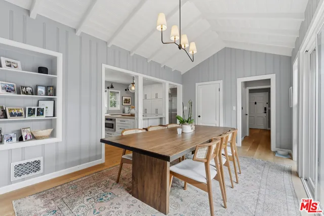 a view of a dining room with furniture