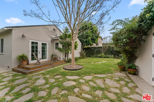 a house view with a garden space