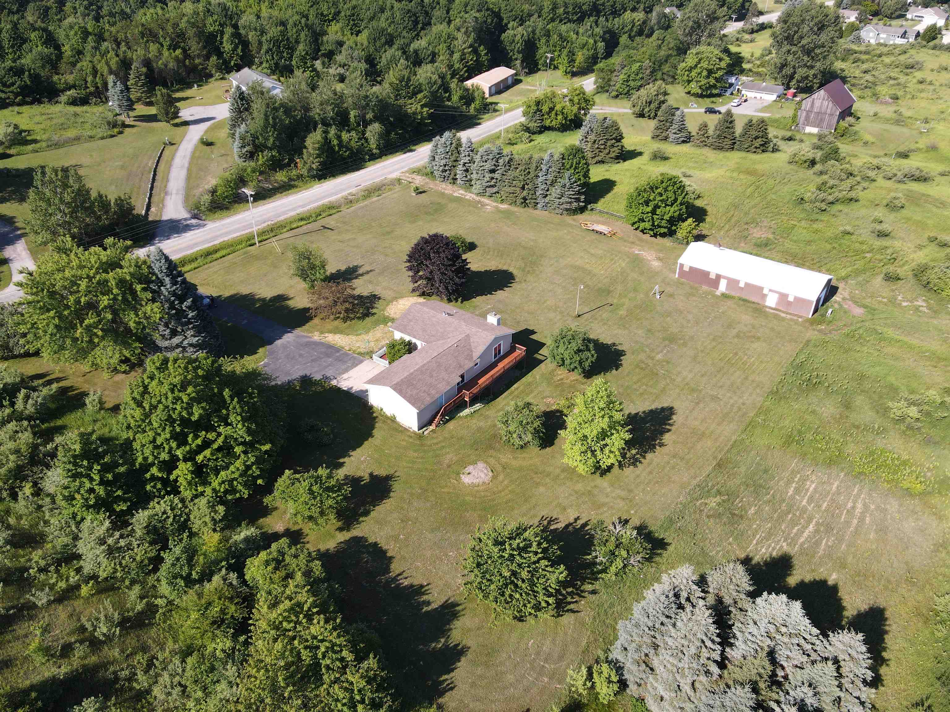 7632 Barney Road Traverse City, MI 49684 - Photo 2 of 30 1936310-fe682b6d-6464-4860-82ab-9c9a616f314e.JPG