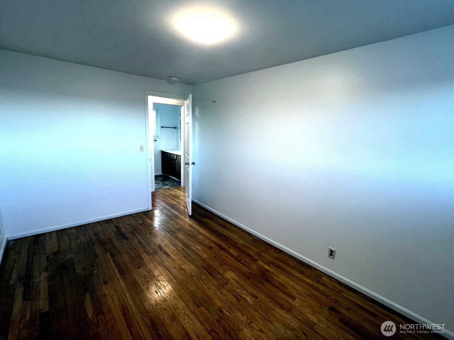 17930 Military Road South SeaTac, WA 98188 - Photo 19 of 19 an empty room with wooden floor and windows
