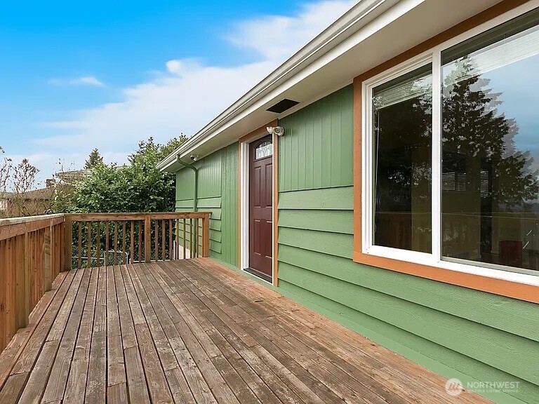 17930 Military Road South SeaTac, WA 98188 - Photo 6 of 19 a view of backyard with a deck and wooden floor