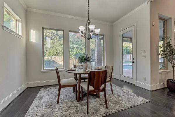 a living room with furniture fireplace and window