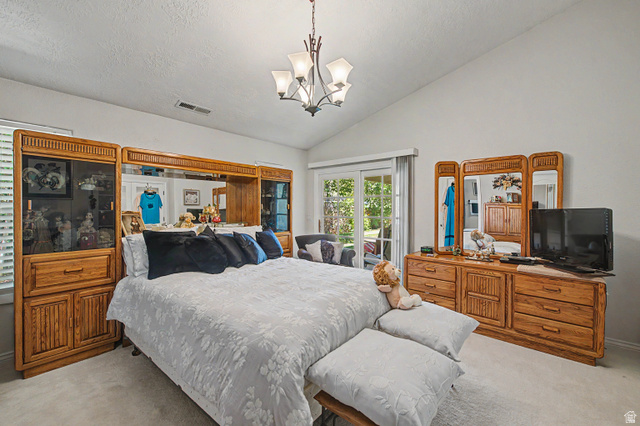 3034 Swiss Drive Santa Clara, UT 84765 - Photo 42 of 59 Vaulted ceiling bedroom with light-colored carpeting