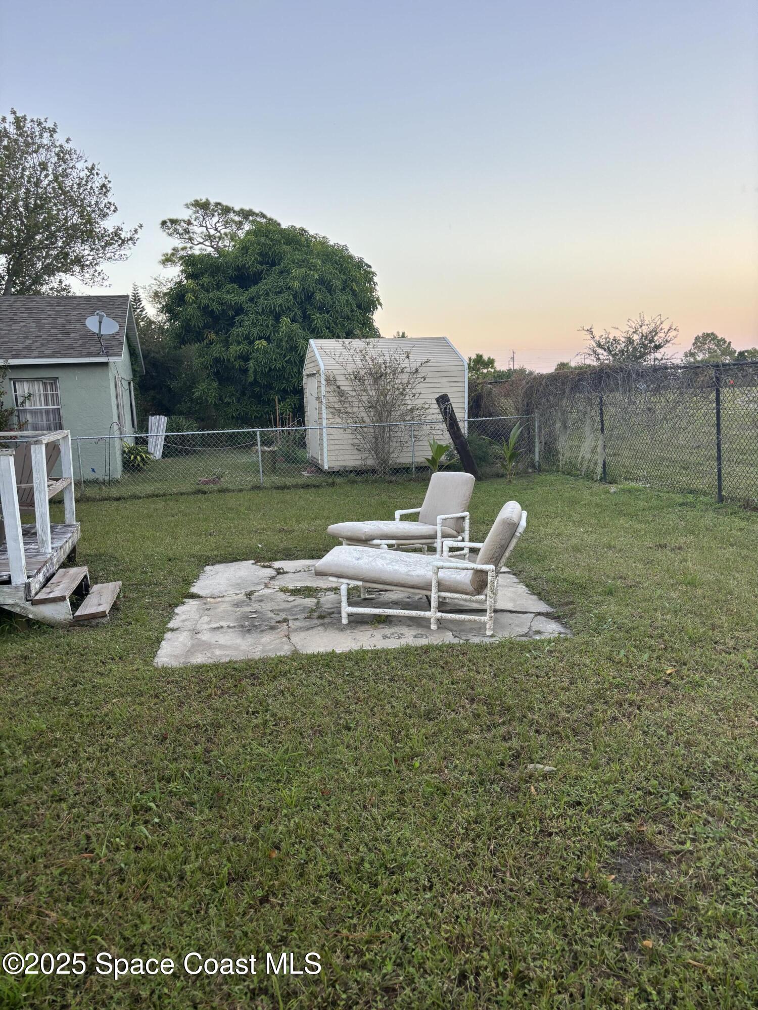514 Donley Street Cocoa, FL 32922 - Photo 18 of 22 a view of a garden with a slide