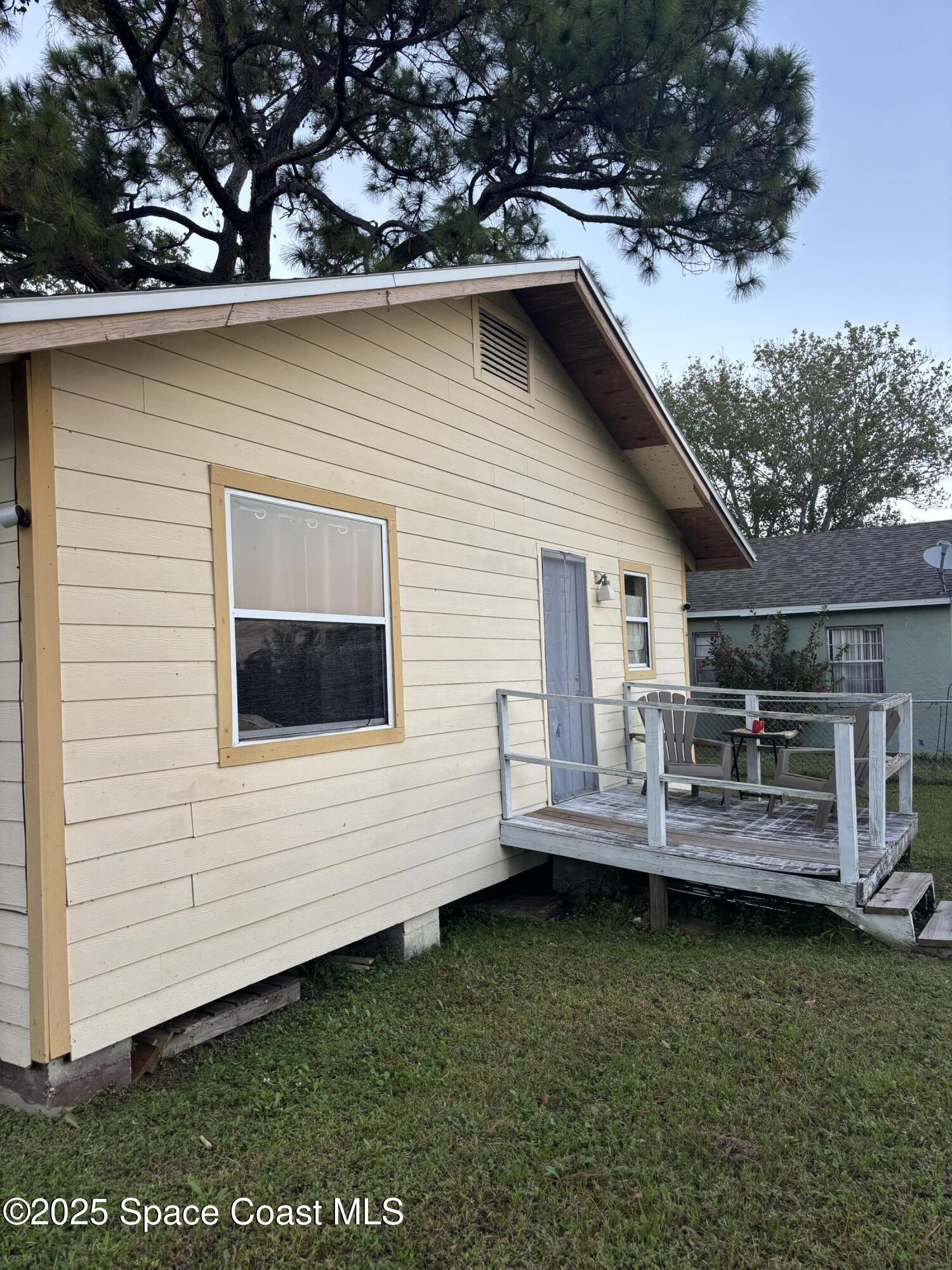 514 Donley Street Cocoa, FL 32922 - Photo 19 of 22 a view of a house with a backyard