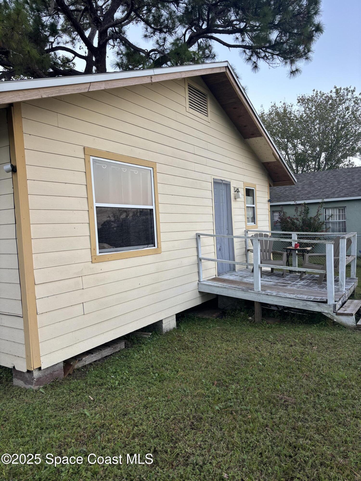 514 Donley Street Cocoa, FL 32922 - Photo 3 of 22 a front view of a house with garden