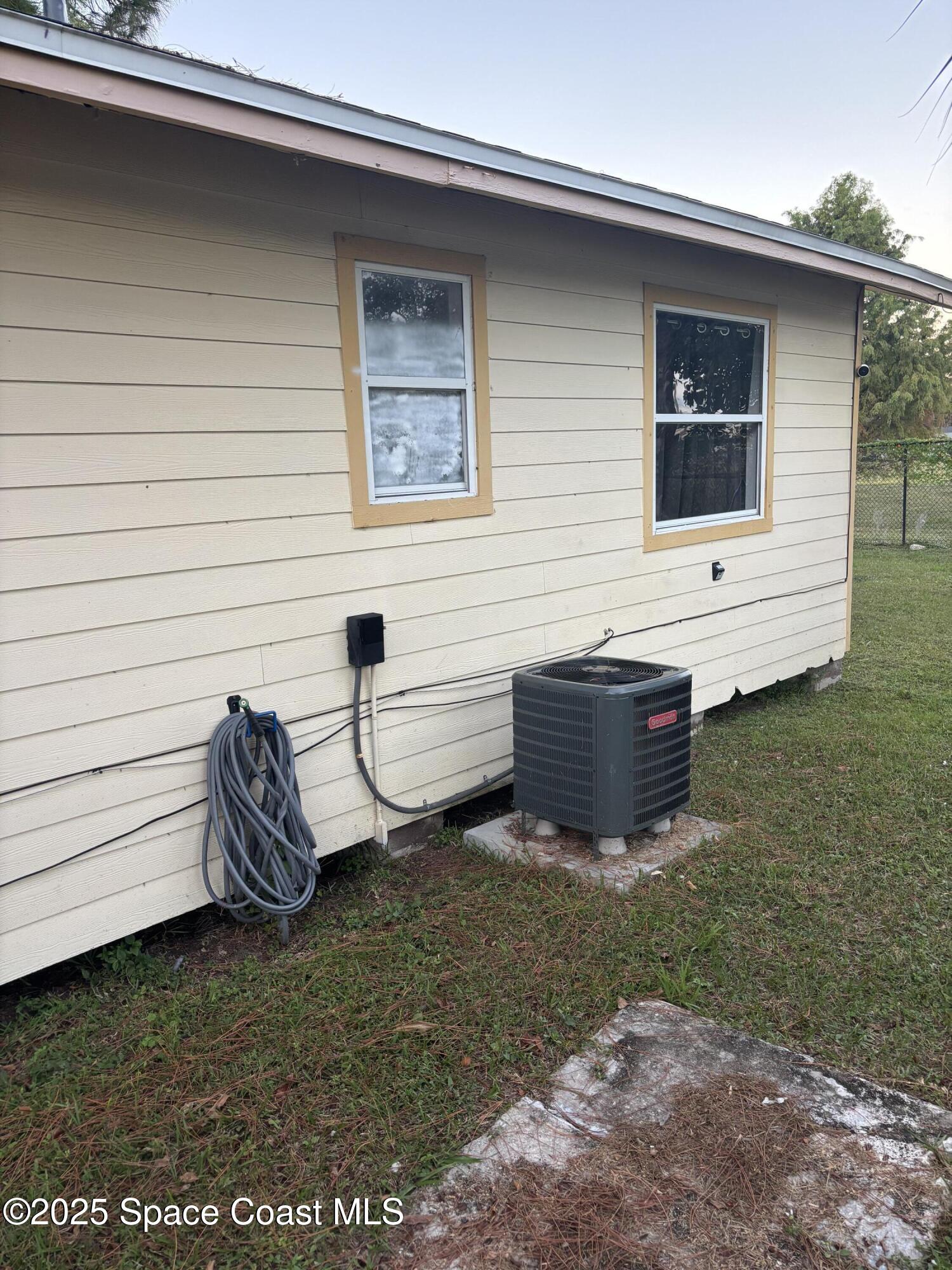 514 Donley Street Cocoa, FL 32922 - Photo 4 of 22 a view of backyard of house and outdoor seating