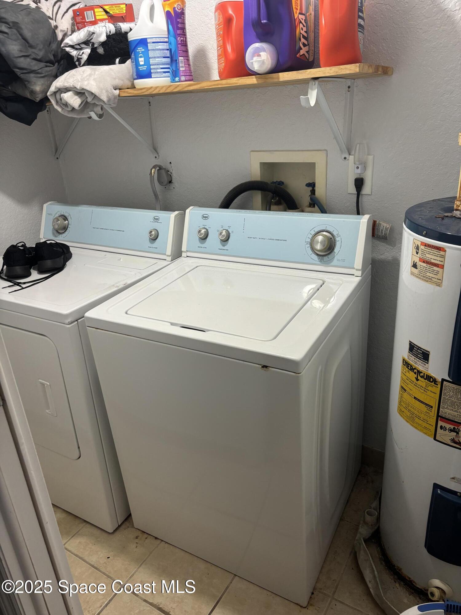 514 Donley Street Cocoa, FL 32922 - Photo 6 of 22 a utility room with dryer and washer
