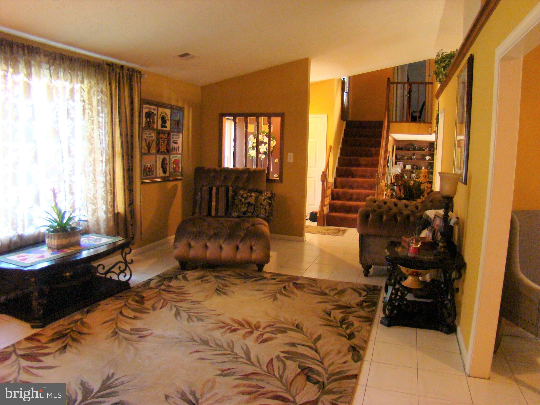 3307 Peach Tree Road Waldorf, MD 20601 - Photo 4 of 27 Living rm w vaulted ceilings and tile floors