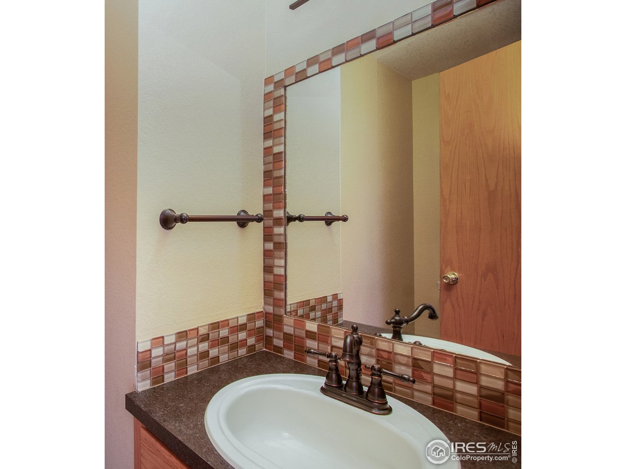 1706 Rutledge Court Fort Collins, CO 80526 - Photo 13 of 20 Remodeled half bath on main floor.