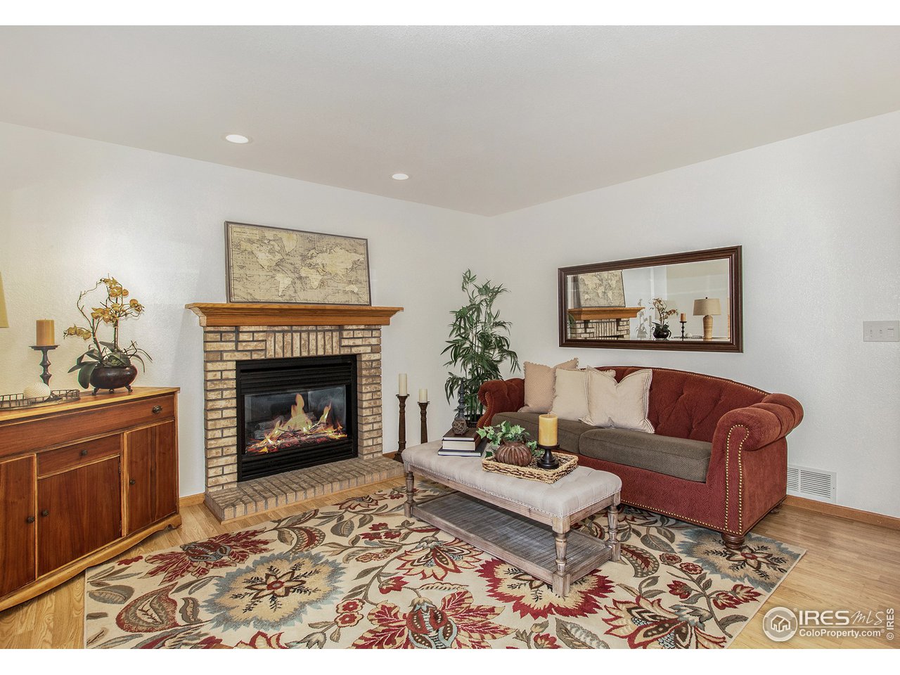 1706 Rutledge Court Fort Collins, CO 80526 - Photo 10 of 20 Family room with gas fireplace.