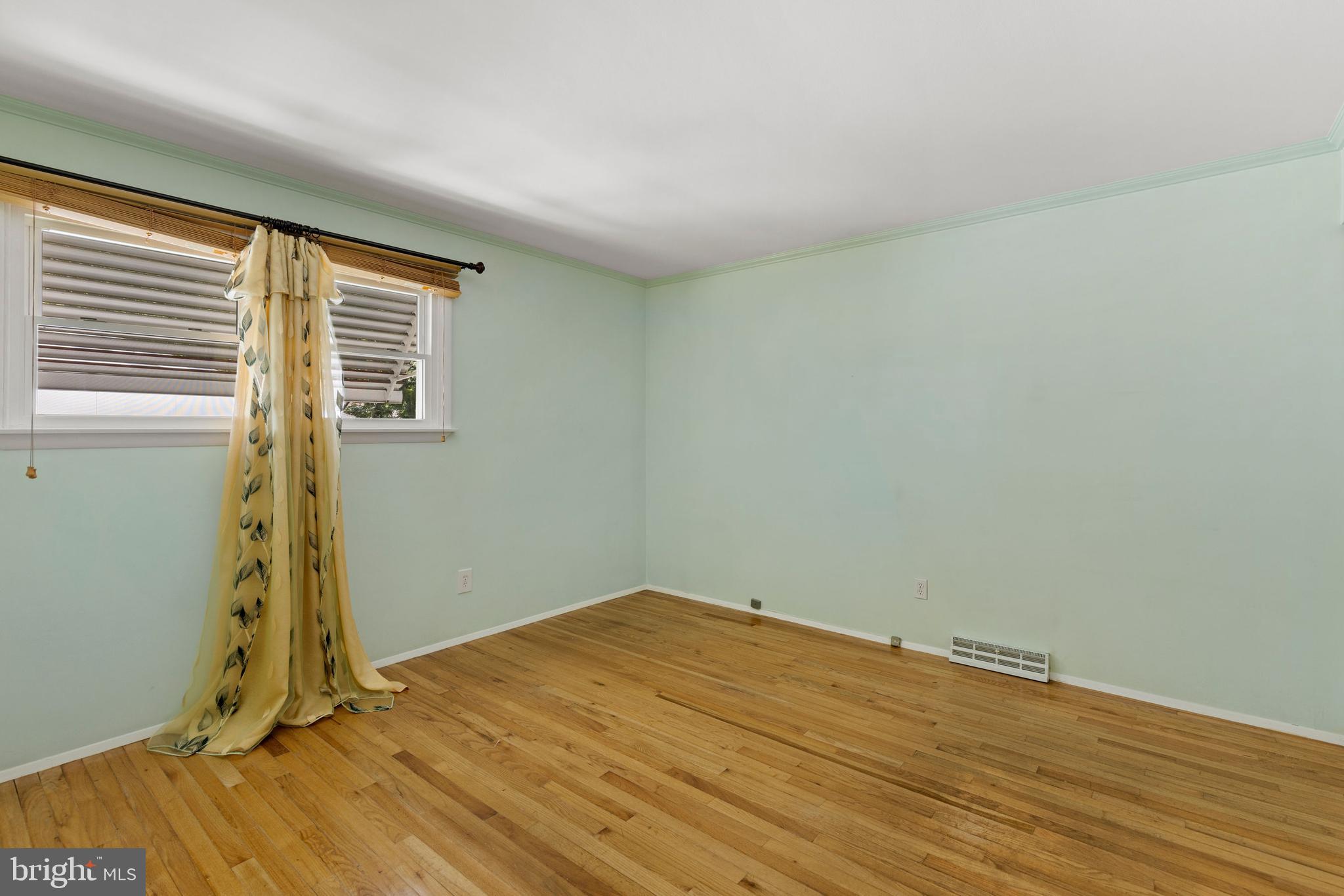 1008 Rosedale Avenue Baltimore, MD 21237 - Photo 15 of 45 wooden floor in an empty room
