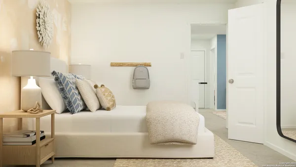 a living room with a couch and a table