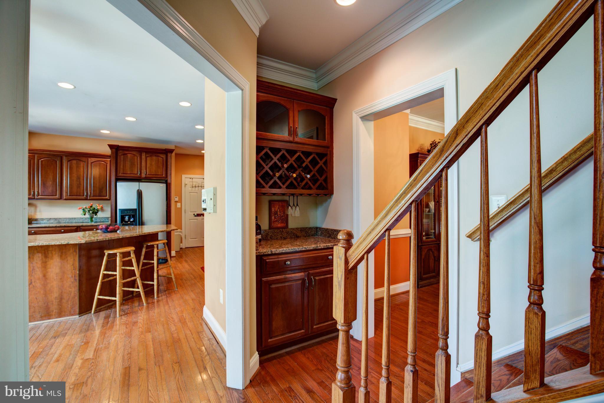 410 Old Kitchen Road White Post, VA 22663 - Photo 13 of 27 a view of a hallway with wooden floor and staircase