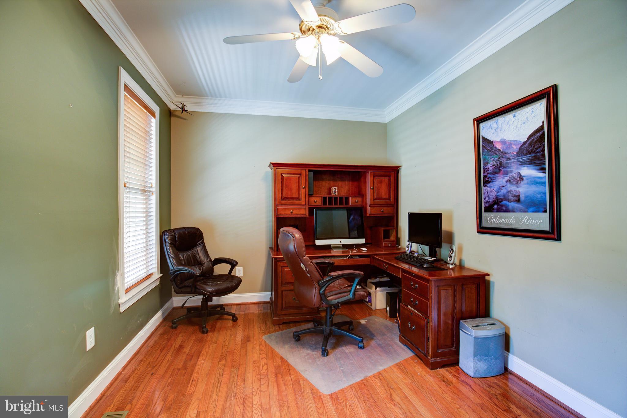 410 Old Kitchen Road White Post, VA 22663 - Photo 16 of 27 a view of a workspace with furniture and a window