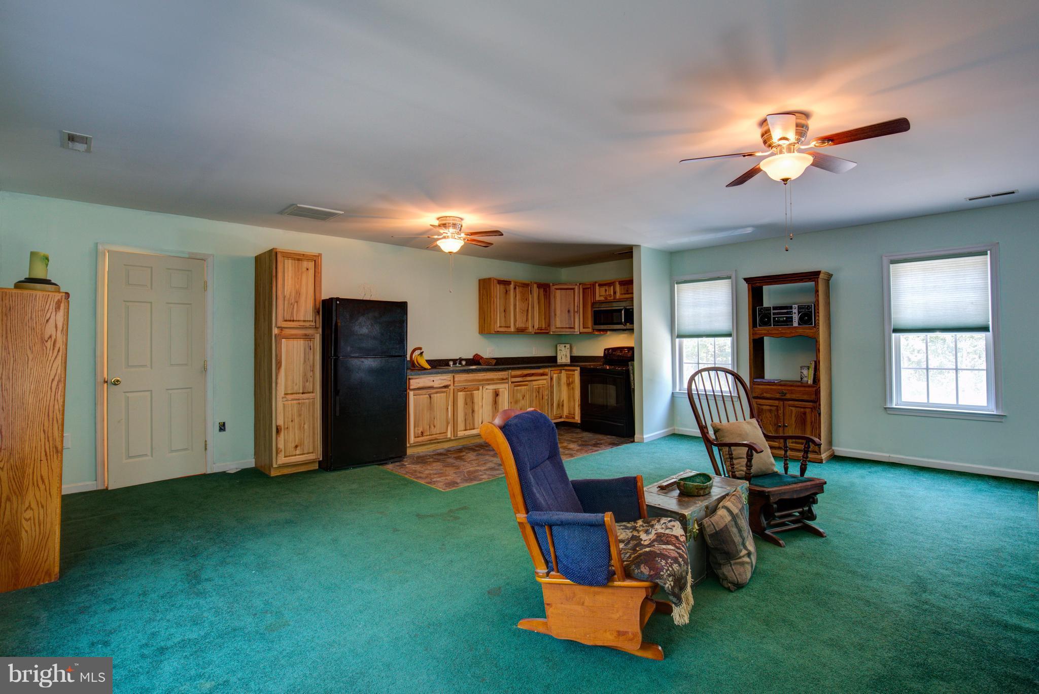 410 Old Kitchen Road White Post, VA 22663 - Photo 26 of 27 a view of a livingroom with furniture and a gym