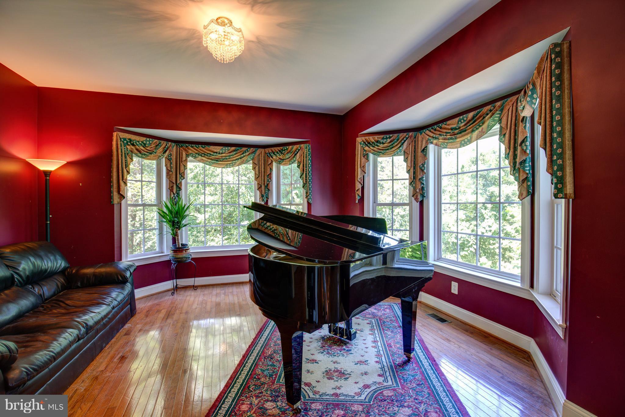 410 Old Kitchen Road White Post, VA 22663 - Photo 8 of 27 a living room with furniture and a floor to ceiling window