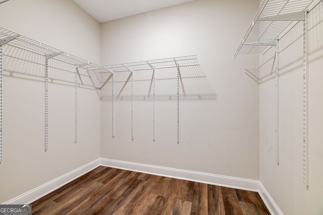 127 Winding Way Road Pembroke, GA 31321 - Photo 25 of 38 a view of a room with racks on the wall