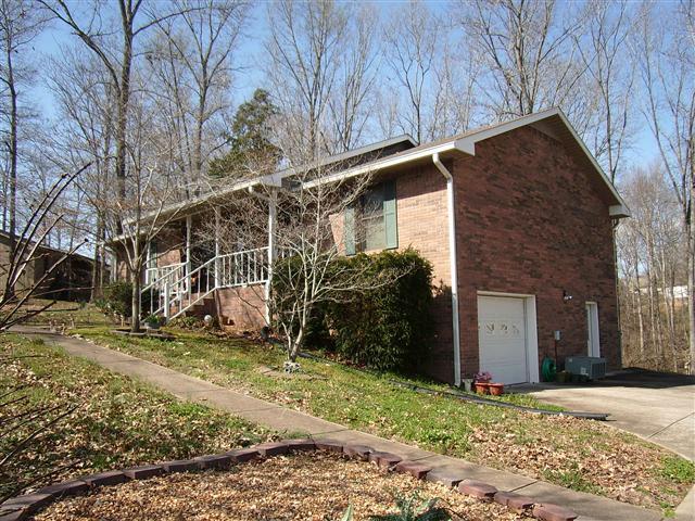 327 49 Overlook Road Dover, TN 37058 - Photo 15 of 19 Full unfinished basement with 1-bay garage
