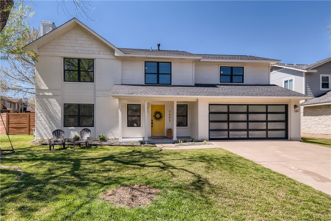 7402 Whistlestop Drive Austin, TX 78749 - Photo 1 of 1 a front view of a house with a yard