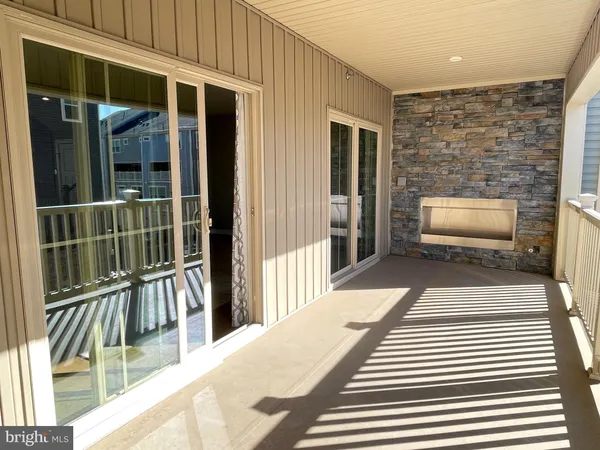 a view of staircase with white walls
