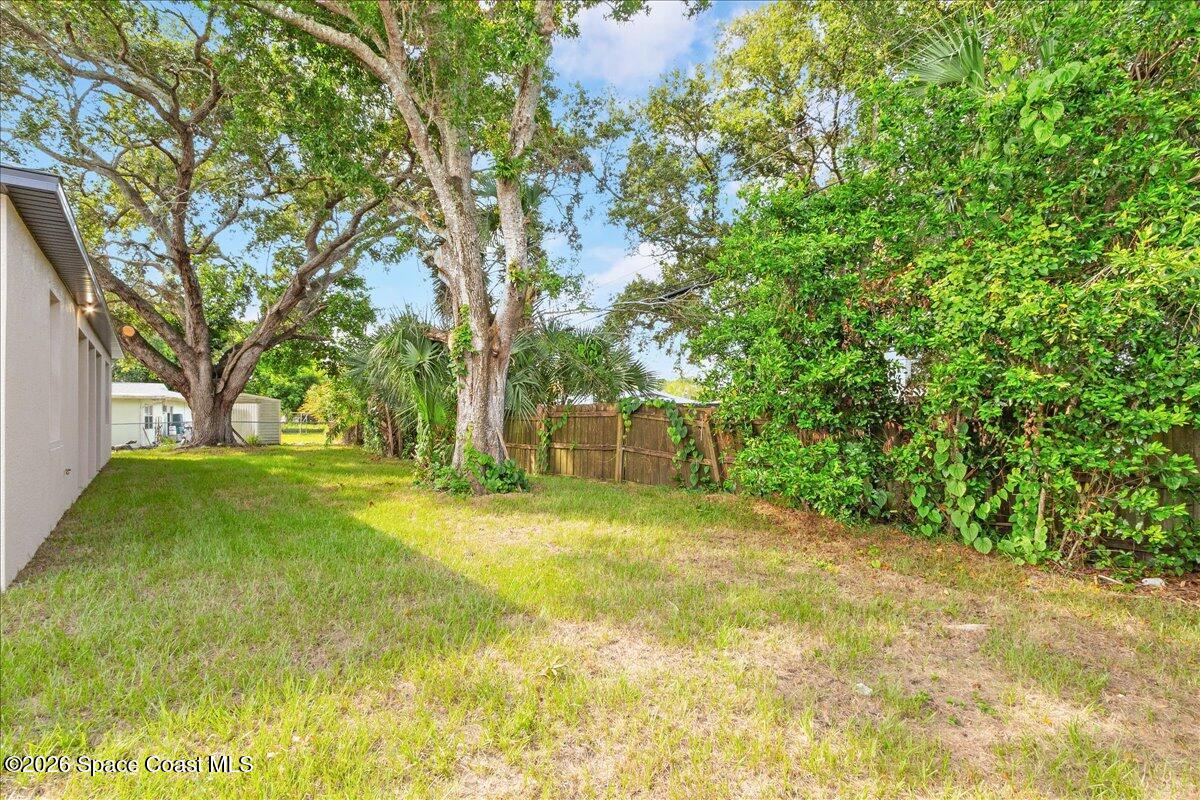 958 Chace Lane Northeast Palm Bay, FL 32905 - Photo 12 of 27 a view of back yard