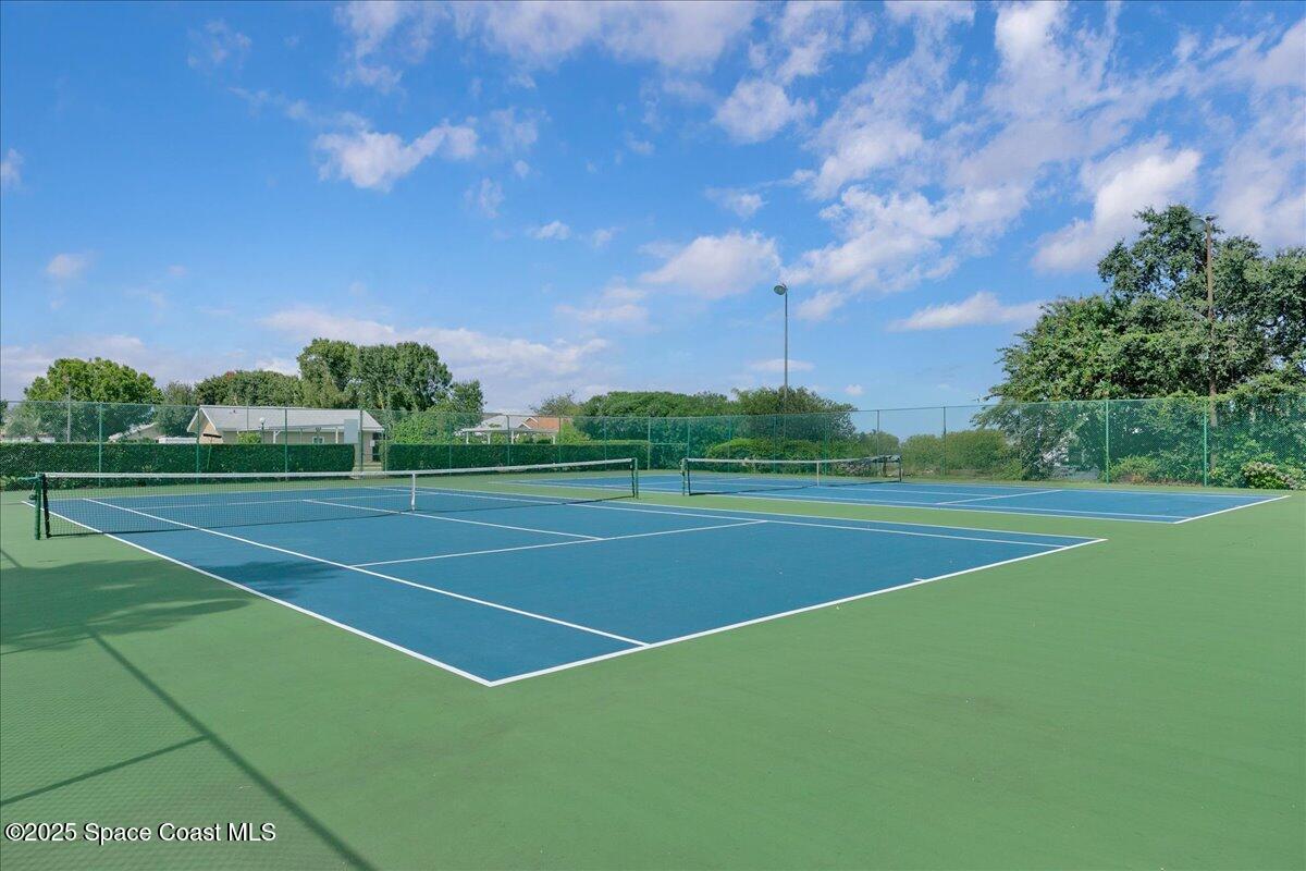 958 Chace Lane Northeast Palm Bay, FL 32905 - Photo 21 of 27 a view of a tennis court