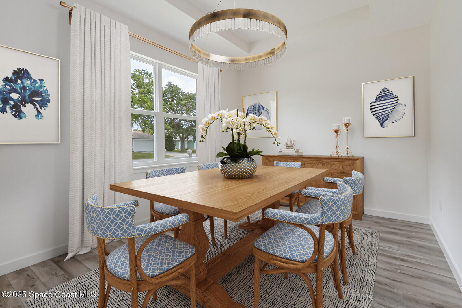 958 Chace Lane Northeast Palm Bay, FL 32905 - Photo 8 of 27 a dining room with furniture and wooden floor